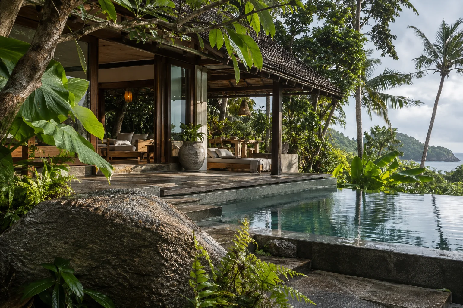 The exterior of one distinct tropical villa, with its garden and shaded outdoor space