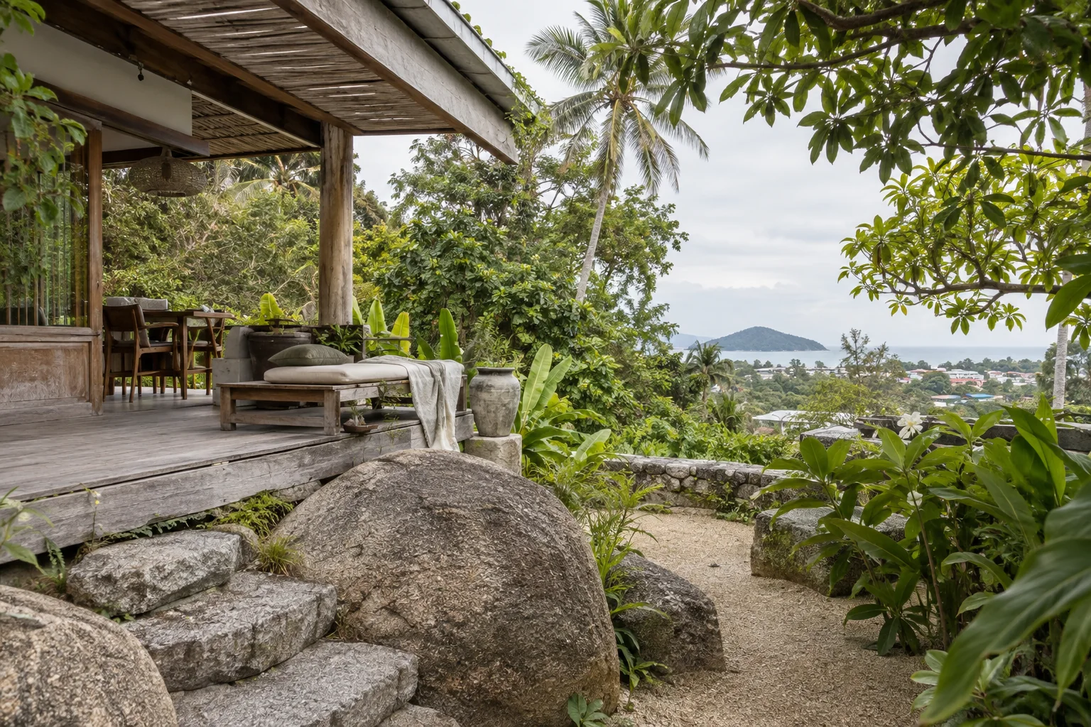 Private villa terrace with outdoor dining and tropical garden