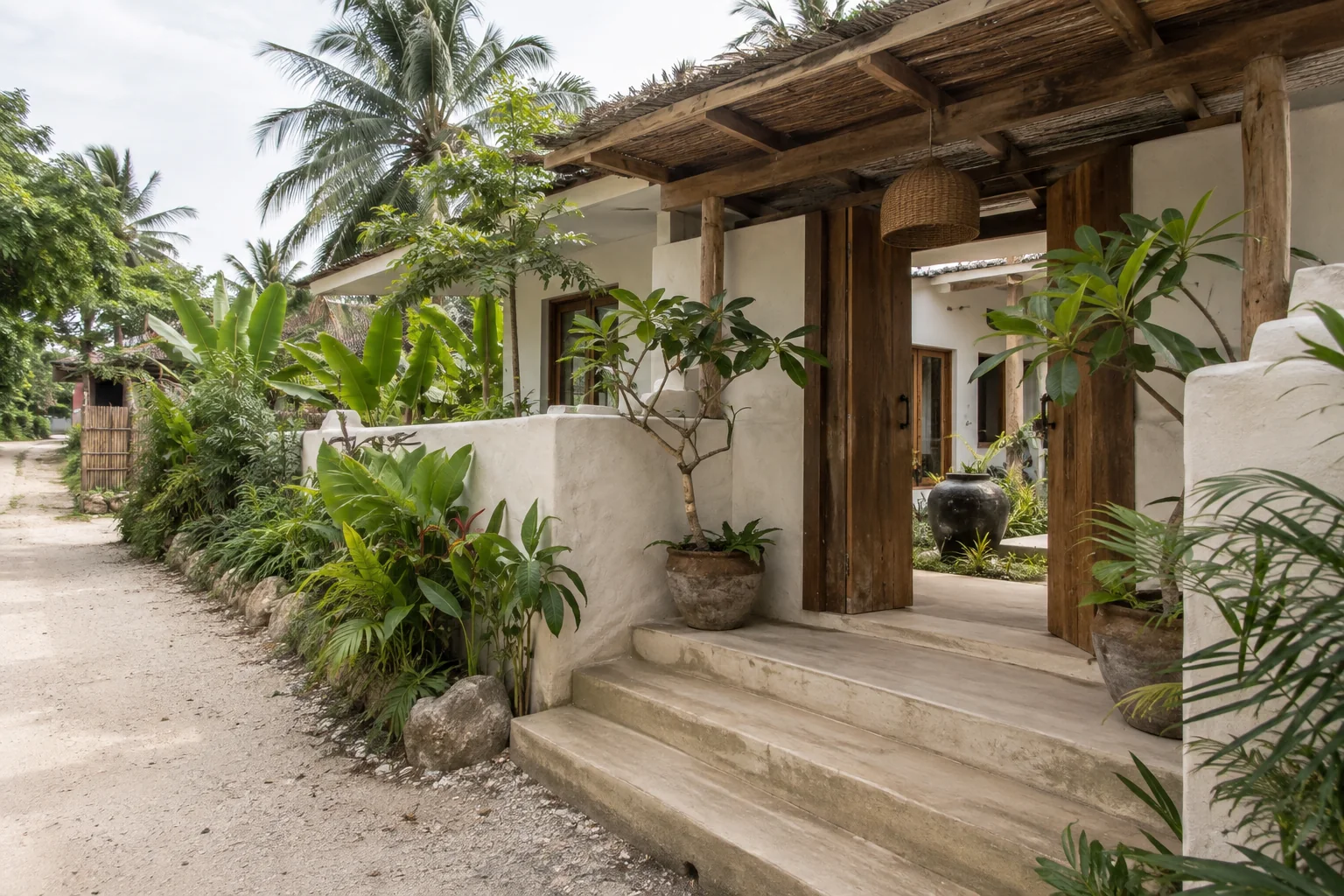 Modern tropical villa exterior and landscaped approach, Koh Phangan